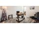 Office space with desk, chair, and carpet flooring at 202 Ash St, Bennett, CO 80102