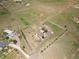 Drone's eye view of the estate, highlighting the home's placement on the expansive acreage at 34771 E 153Rd Ct, Hudson, CO 80642