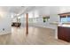 Expansive basement with a large open area, view-filled windows, and light-colored wood flooring at 34771 E 153Rd Ct, Hudson, CO 80642