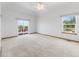 This spacious bedroom features a ceiling fan, and access to a private deck at 34771 E 153Rd Ct, Hudson, CO 80642