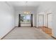 Bright living room features neutral walls and a ceiling light fixture at 34771 E 153Rd Ct, Hudson, CO 80642