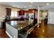 Modern kitchen featuring stainless steel appliances and hardwood floors at 6945 Fargo Trl, Littleton, CO 80125