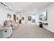 Spacious finished basement with plush carpeting, recessed lighting, and a comfortable seating area at 18984 W 85Th Blf, Arvada, CO 80007