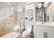 Modern bathroom with a glass-enclosed shower, vanity, and contemporary fixtures at 18984 W 85Th Blf, Arvada, CO 80007