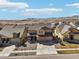 Aerial view of a well-maintained home and surrounding neighborhood at 18984 W 85Th Blf, Arvada, CO 80007