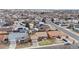 An aerial view showcasing a neighborhood featuring various single-Gathering homes and residential streets at 412 N 10Th Ave, Brighton, CO 80601