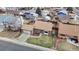 Aerial shot features a charming home with a well-maintained front yard and landscaping at 412 N 10Th Ave, Brighton, CO 80601