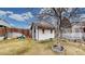 Backyard featuring a shed and mature landscaping at 412 N 10Th Ave, Brighton, CO 80601