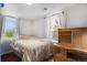 Bright bedroom with two windows and hardwood floors at 150 N 7Th Ave, Brighton, CO 80601