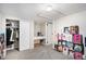 Carpeted bedroom featuring a closet, desk and storage at 150 N 7Th Ave, Brighton, CO 80601