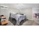 Cozy bedroom featuring a bed with gray bedding, and carpeted floors at 150 N 7Th Ave, Brighton, CO 80601