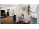 Open-concept view of the living room and kitchen in this well-maintained home at 150 N 7Th Ave, Brighton, CO 80601