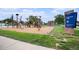 Montoya Park sign next to playground equipment and a grassy area with a sidewalk at 150 N 7Th Ave, Brighton, CO 80601