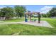 Enjoy picnics at the community park with a shaded picnic shelter and tables surrounded by lush greenery at 150 N 7Th Ave, Brighton, CO 80601