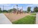 A colorful playground offers a safe space for to play with climbing structures and slides near lush green spaces at 150 N 7Th Ave, Brighton, CO 80601