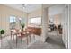 Cozy dining area adjacent to the bedroom, featuring modern furniture and decor at 2662 S Cathay Way # 110, Aurora, CO 80013