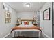 Cozy bedroom with bright lighting and contemporary decor at 2050 S Wolff St, Denver, CO 80219