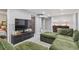 Cozy living room area with plush seating and modern decor at 2050 S Wolff St, Denver, CO 80219