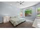 Serene bedroom with large windows offering picturesque views and soft, inviting decor at 11645 Colony Loop, Parker, CO 80138