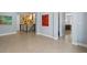 Hallway featuring tile floors, neutral paint and view of a staircase at 11645 Colony Loop, Parker, CO 80138