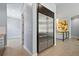 Open-concept kitchen with stainless steel refrigerator and modern design at 11645 Colony Loop, Parker, CO 80138