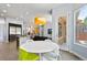 Bright open kitchen connected to dining area with stainless steel appliances at 11645 Colony Loop, Parker, CO 80138