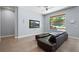 Comfortable living room with large window and entertainment center at 11645 Colony Loop, Parker, CO 80138