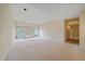 Unfurnished basement with large windows, providing ample natural light and walkout access at 787 W Meadow Rd, Evergreen, CO 80439