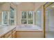 Beautiful soaking tub with bright natural light at 787 W Meadow Rd, Evergreen, CO 80439