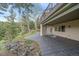 Spacious patio with covered area, stone accents and great mountain views at 787 W Meadow Rd, Evergreen, CO 80439