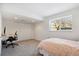 Bedroom with desk area, a closet, and a window for natural light at 9176 Sugarstone Cir, Highlands Ranch, CO 80130