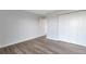 Bright bedroom features wood floors and closet for ample storage at 460 S Marion Pkwy # 1351, Denver, CO 80209