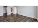 Bedroom area with wood floors with an adjoining full bath and laundry area at 460 S Marion Pkwy # 1351, Denver, CO 80209