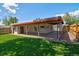 Large backyard with ample parking and green space for entertaining at 1560 Simms St, Lakewood, CO 80215
