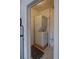 Convenient laundry area with a stackable washer and dryer unit at 1560 Simms St, Lakewood, CO 80215