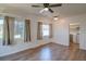 Open living space with hardwood floors and access to the kitchen at 1560 Simms St, Lakewood, CO 80215