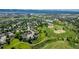 Aerial view of a neighborhood next to baseball fields at 551 Snowy Owl Pl, Highlands Ranch, CO 80126