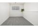 Bright bedroom offers neutral carpet, white walls, and a sunny window at 551 Snowy Owl Pl, Highlands Ranch, CO 80126