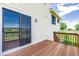 This home has a wooden deck outside with beautiful sliding glass doors at 551 Snowy Owl Pl, Highlands Ranch, CO 80126