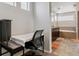 This bathroom features a double sink vanity, soaking tub, and separate walk-in shower at 23593 E Chenango Pl, Aurora, CO 80016
