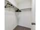 Walk-in closet featuring ample shelving space for organizing clothes and accessories at 23593 E Chenango Pl, Aurora, CO 80016