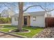 Lovely home with manicured lawn, rock garden and mature trees in a desirable location at 1130 Orchard St, Golden, CO 80401