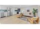 Bright living room features light hardwood floors, and ample natural light, and provides an open floor plan at 1130 Orchard St, Golden, CO 80401