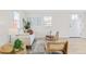 Bright living room features light hardwood floors, and ample natural light, and provides an open floor plan at 1130 Orchard St, Golden, CO 80401