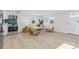 Bright living room features light hardwood floors, and ample natural light, and provides an open floor plan at 1130 Orchard St, Golden, CO 80401