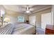 Comfortable bedroom features a ceiling fan, closet, and natural light from the window at 1290 Mesa Ct, Golden, CO 80403