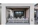 Balcony furnished with a cozy sofa, outdoor chairs and throw pillows for relaxing at 10113 Bellwether Ln, Lone Tree, CO 80124