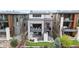 Contemporary home showcasing outdoor balconies, a landscaped backyard, and modern architecture at 10113 Bellwether Ln, Lone Tree, CO 80124