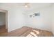 Bright bedroom featuring hardwood floors and a ceiling fan at 1151 Xanthia St, Denver, CO 80220