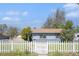 Charming bungalow featuring a well-manicured lawn at 1151 Xanthia St, Denver, CO 80220
